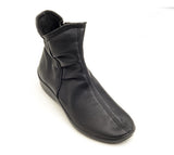 Black slouchy bootie, ankle height. Black vegan leather, inside zipper closure, black rubber sole.